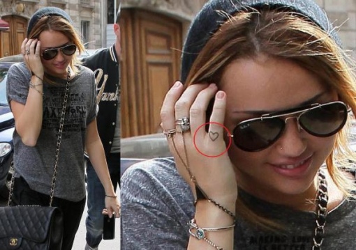 miley cyrus tattoo finger. For their tattoos on the chest